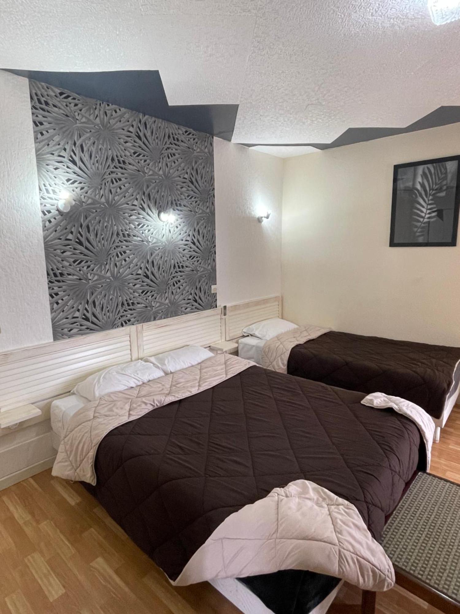 Hotel Auberge Des Charmilles Sainte-Soulle Quarto foto